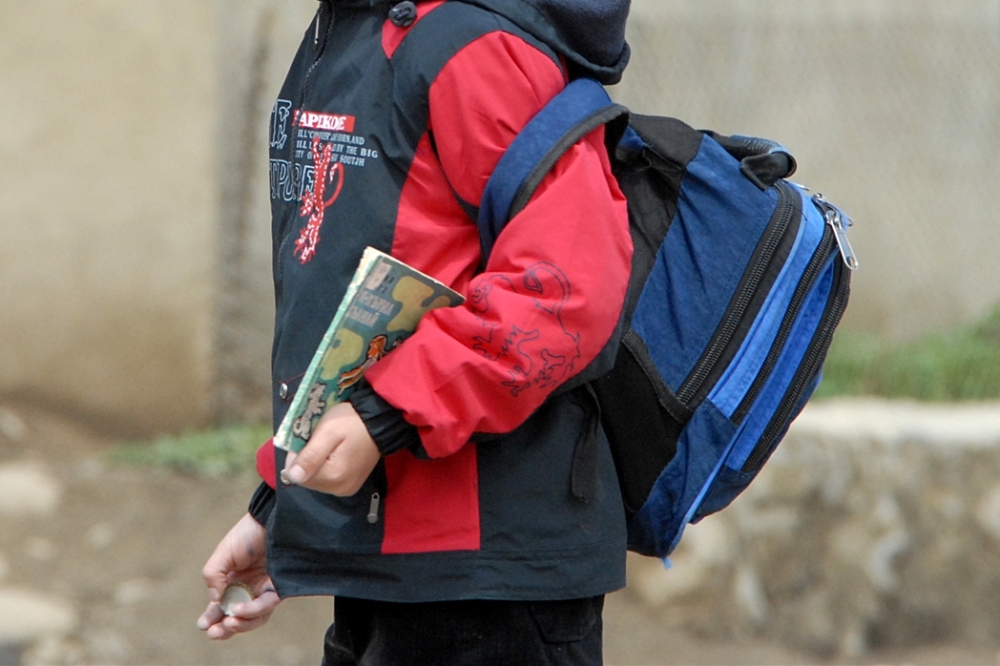 Ученик с рюкзаком