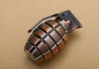 Граната на столе