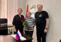 Вручение медали матери участника СВО