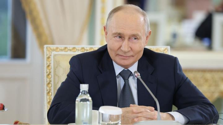 Путин