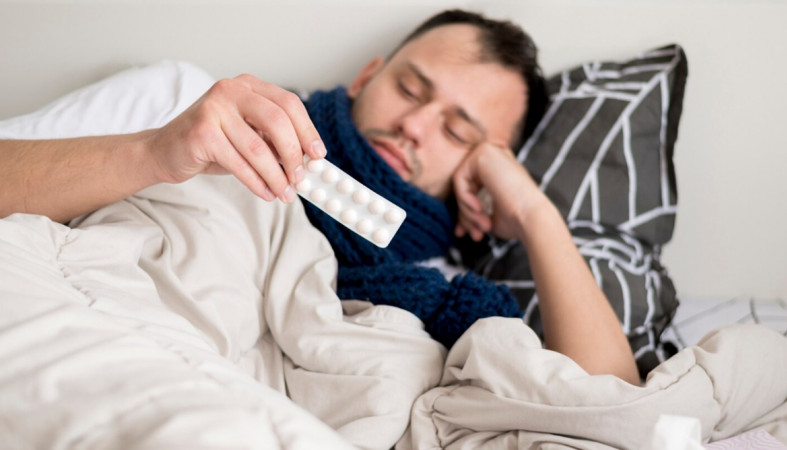 болеющий мужчина