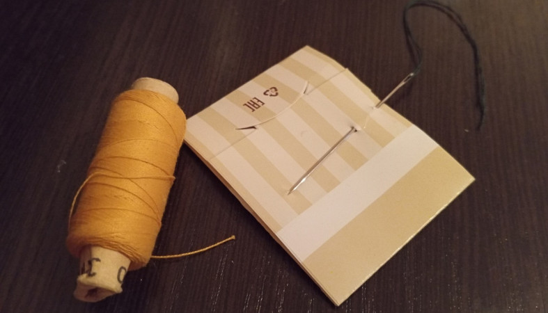 иголка с ниткой