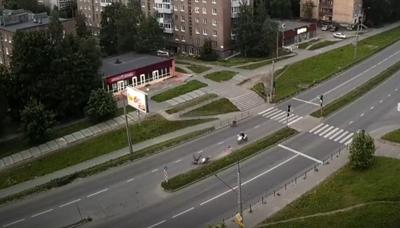 упавший байкер